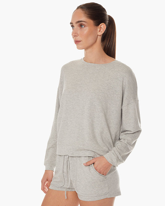 Image of a model wearing Tops. Productname: Coucher de Soleil Crew Heather Grey in Heather Grey colour by brand - TKEES