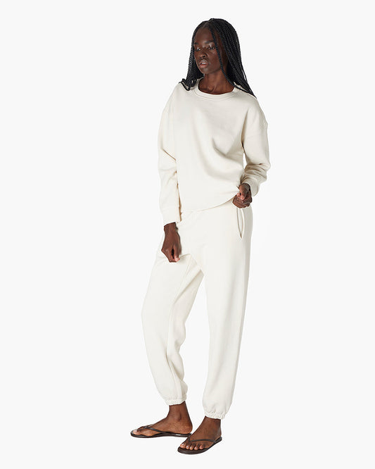 Image of a model wearing Tops. Productname: Air Whipped Crew Bone in Bone colour by brand - TKEES