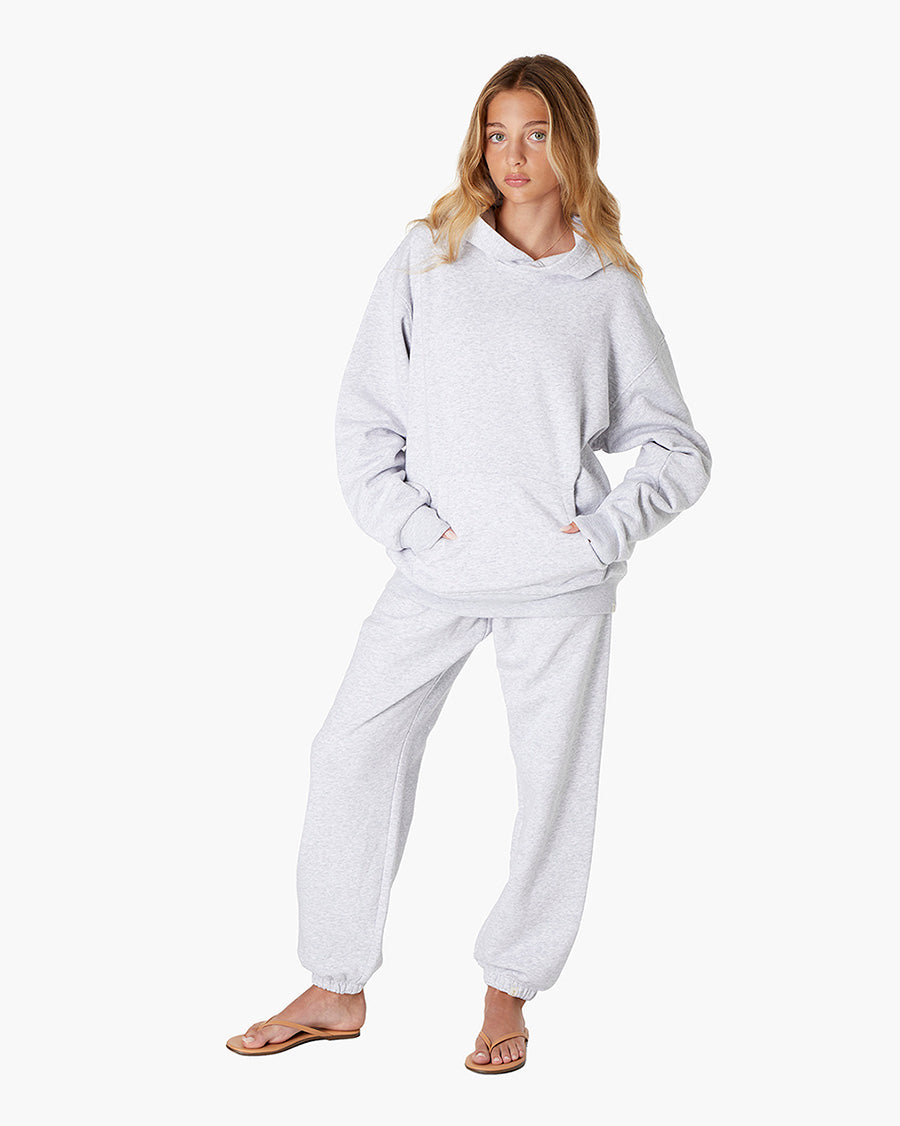 Image of a model wearing Outerwear. Productname: Air Whipped Hoodie Heather Grey in Heather Grey colour by brand - TKEES