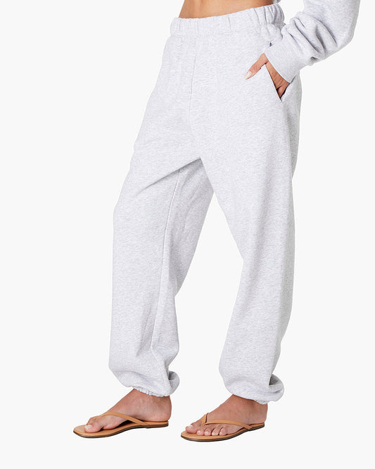 Image of a model wearing Pants. Productname: Air Whipped Sweatpant Heather Grey in Heather Grey colour by brand - TKEES