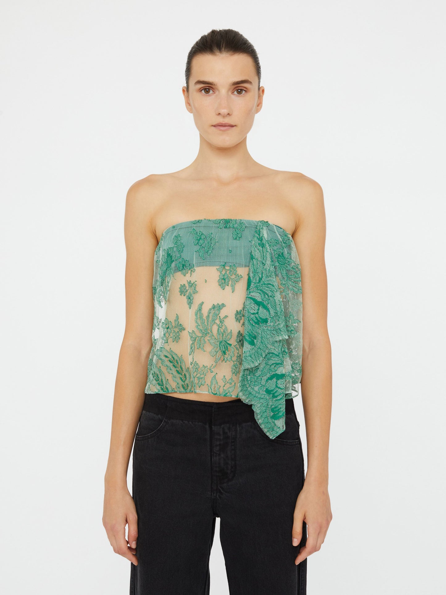 Image of a model wearing Tops. Product name - Floating Lace Strapless Top in Top colour by brand - Christopher Esber