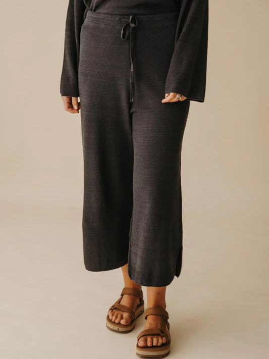 Image of a model wearing Pants. Productname: Talamaya Retreat Cotton Pant in Blk Sand & Deep Ocean colour by brand - Talamaya