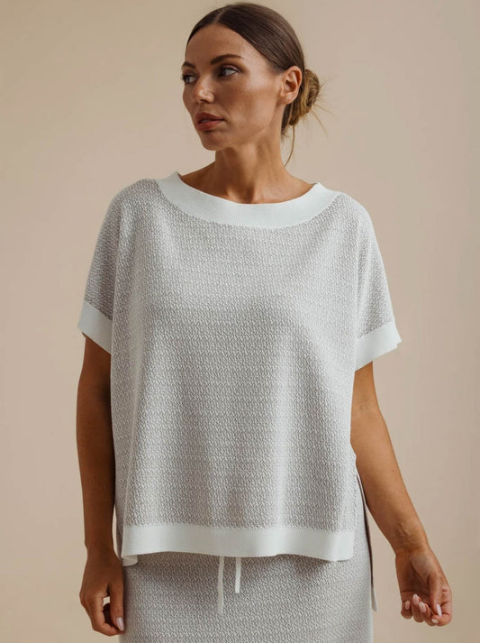 Image of a model wearing Outerwear. Product name - TALAMAYA CREPE KNITTED TEE in Salt/Granite colour by brand - Talamaya