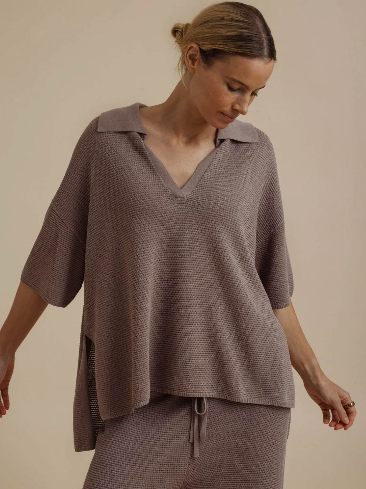 Image of a model wearing Outerwear. Product name - TALAMAYA LATTICE CRUISE PULLOVER in Husk colour by brand - Talamaya