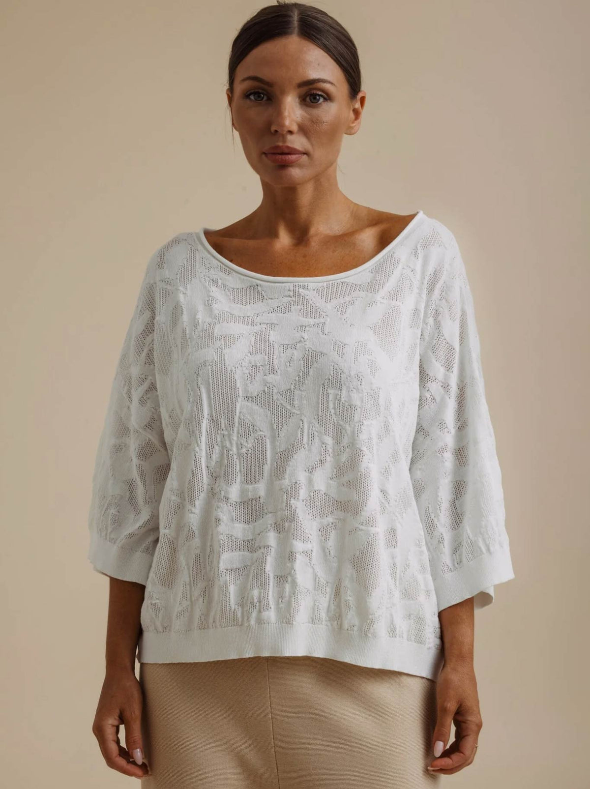 Image of a model wearing Outerwear. Product name - TALAMAYA PARADIS JACQUARD PULLOVER in Salt colour by brand - Talamaya