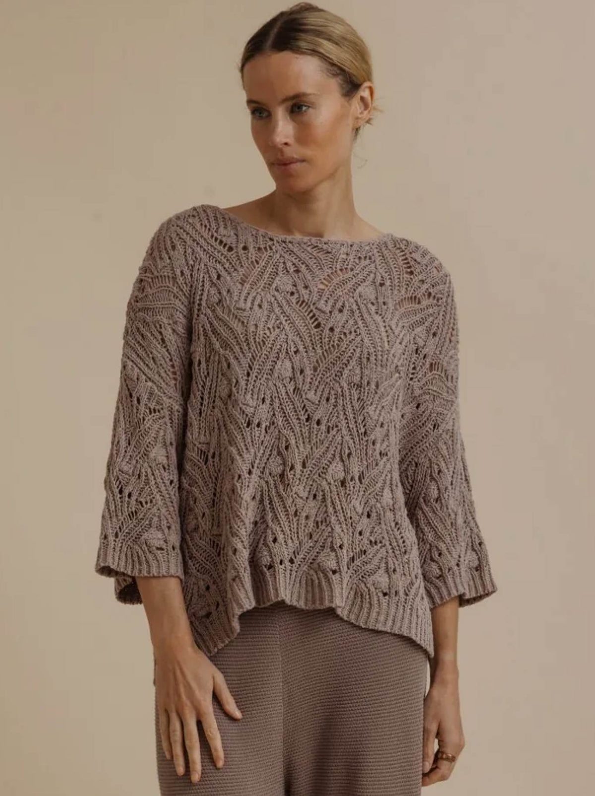 Image of a model wearing Outerwear. Product name - Talamaya Prism Pullover in Husk colour by brand - Talamaya