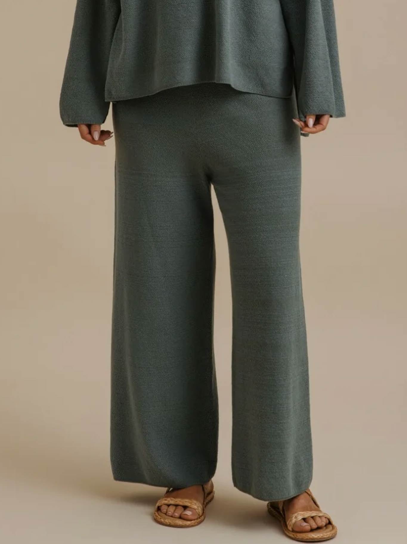 Image of a model wearing Pants. Product name - Talamaya Retreat Cotton Twist Full Length Pant in Rainforest colour by brand - Talamaya