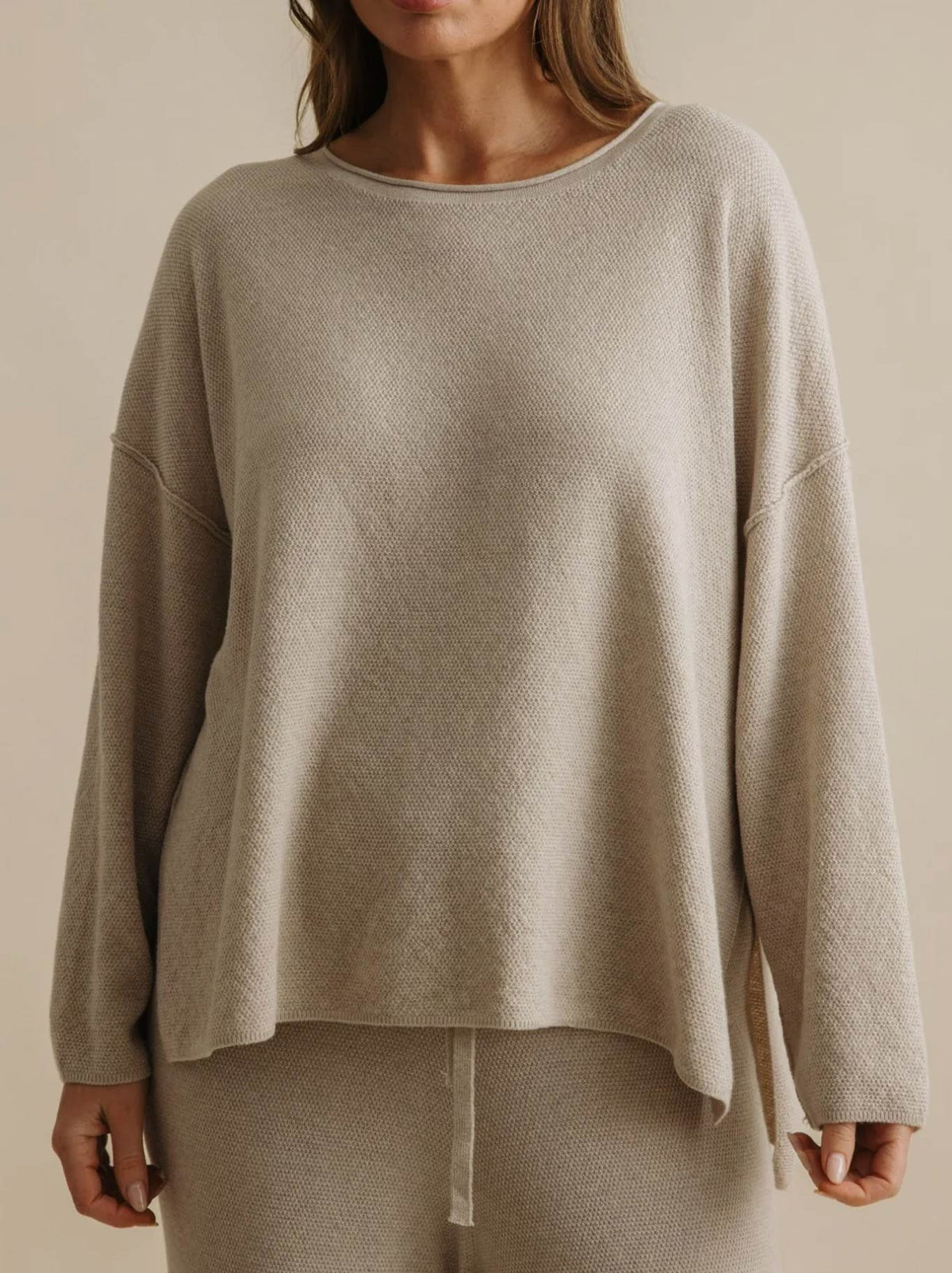 Image of a model wearing Tops. Product name - TALAMAYA WINTER RETREAT PULLOVER in Wheat colour by brand - Talamaya