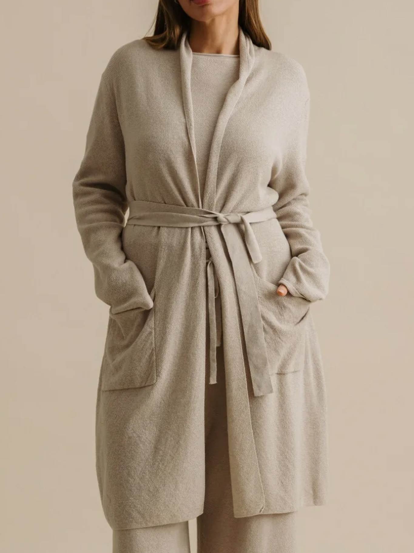 Image of a model wearing Outerwear. Productname: Talamaya Winter Retreat Shawl Cardi in Wheat colour by brand - Talamaya