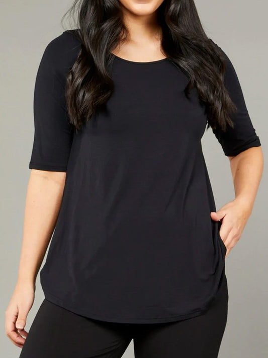 Image of a model wearing Tops. Productname: TANI ELBOW SWING TEE in Black colour by brand - Tani