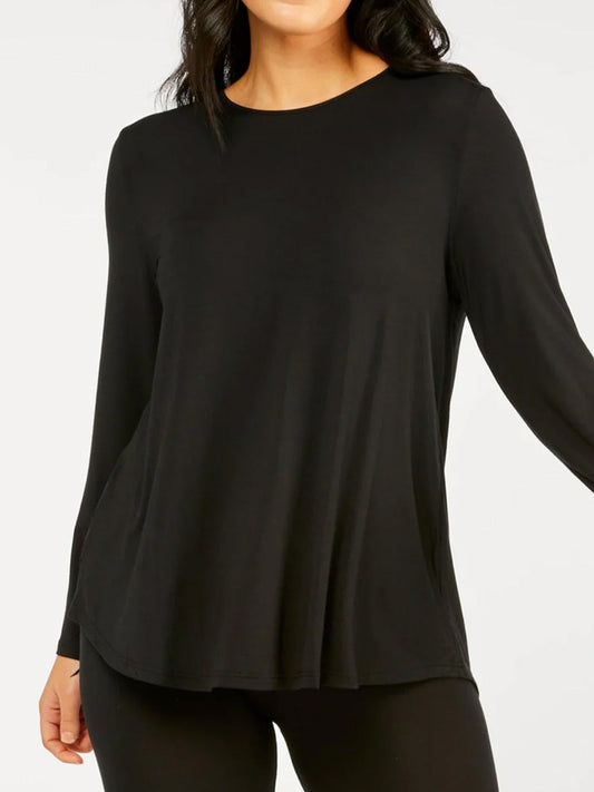Image of a model wearing Tops. Productname: TANI CARA LONG SLEEVE TOP in Black colour by brand - Tani