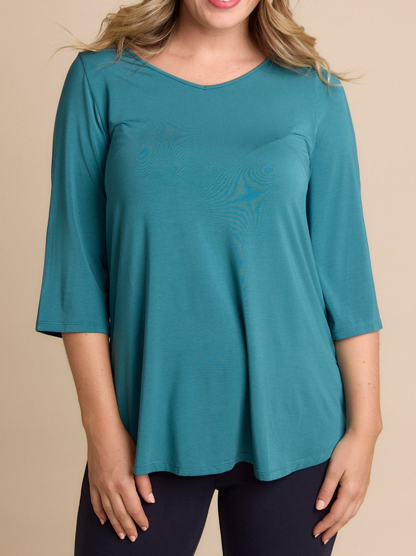 Image of a model wearing Tops. Productname: TANI TILLY 3/4 SLEEVE TOP in Peacock colour by brand - Tani
