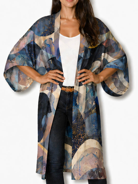 Image of a model wearing Tops. Product name - The Artists Label Celestial Waves Long Silk Kimono in Print colour by brand - The Artist Label