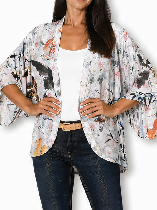 Image of a model wearing Tops. Product name - The Artists Label Seasons In Japan Silk Kimono in Print colour by brand - The Artist Label