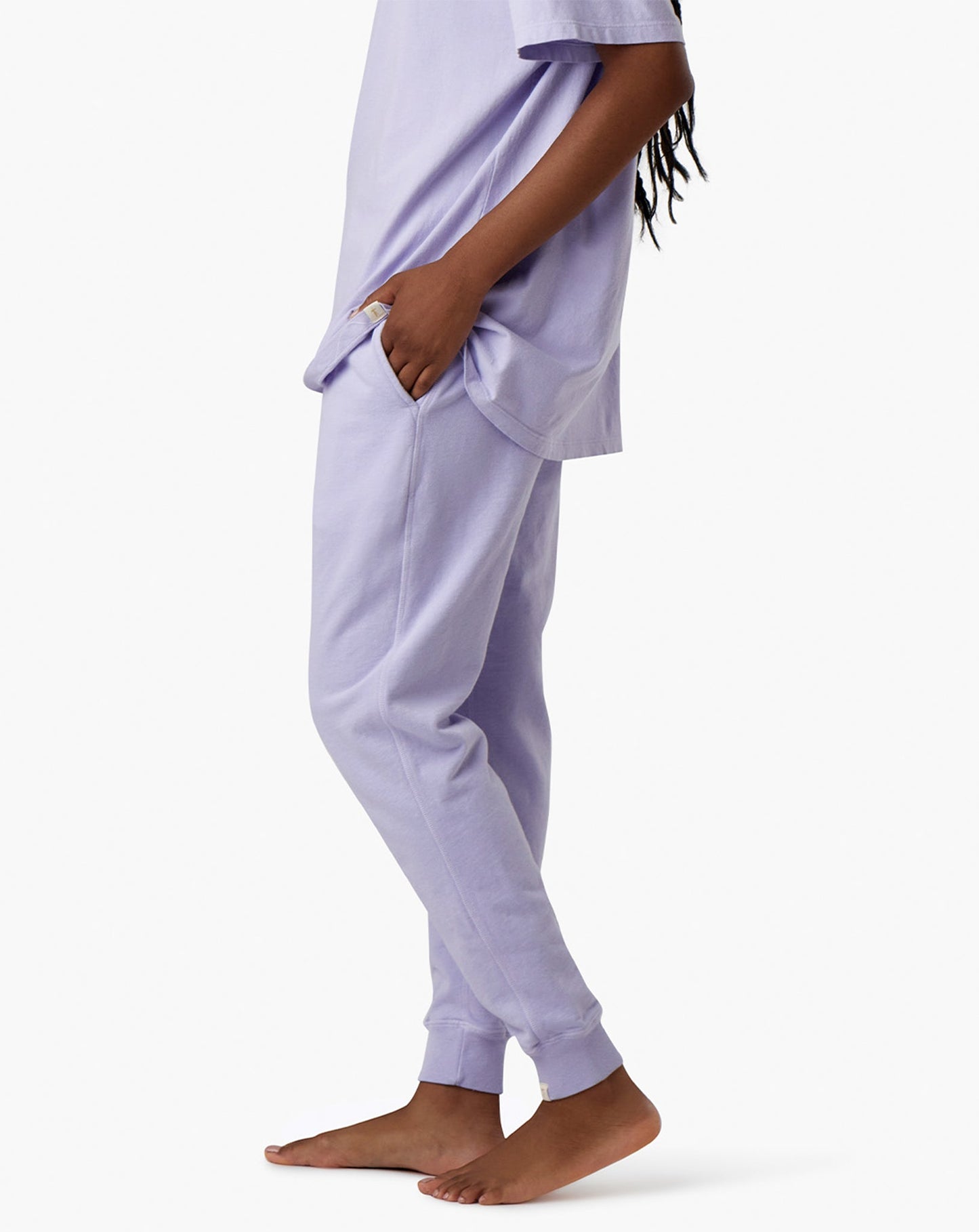 Image of a model wearing Pants. Productname: Core Sport Jogger Lovely Lavender in Lovely Lavender colour by brand - TKEES
