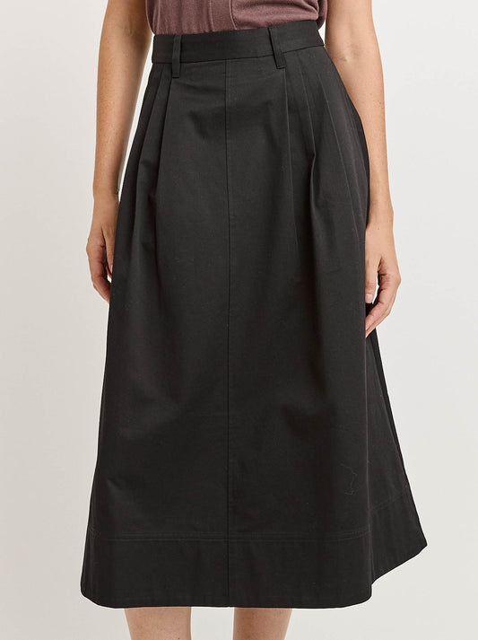 Image of a model wearing Skirts. Product name - TOORALLIE PLEAT DETAIL MIDI SKIRT in Black colour by brand - Toorallie