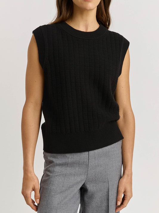 Image of a model wearing Tops. Productname: TOORALLIE GRID KNIT VEST in Black colour by brand - Toorallie