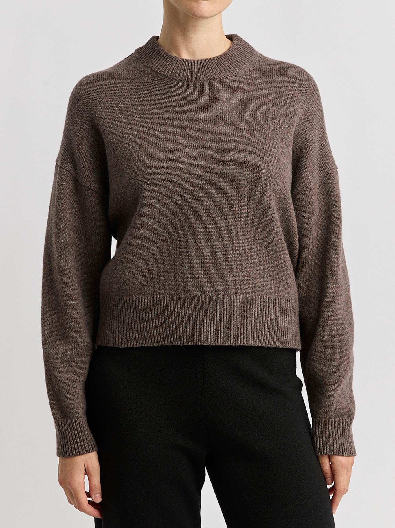 Image of a model wearing Outerwear. Product name - Toorallie Drop Shoulder Crew in Mocha colour by brand - Toorallie