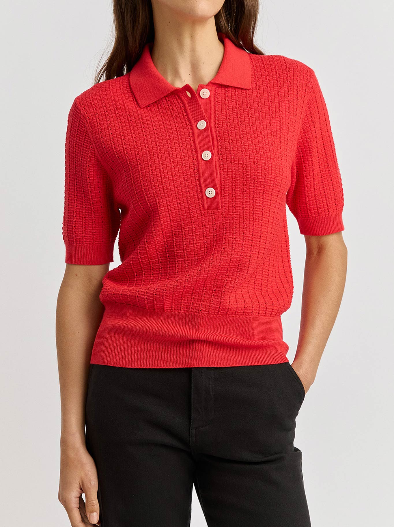 Image of a model wearing Tops. Productname: TOORALLIE KNIT POLO in Poppy colour by brand - Toorallie