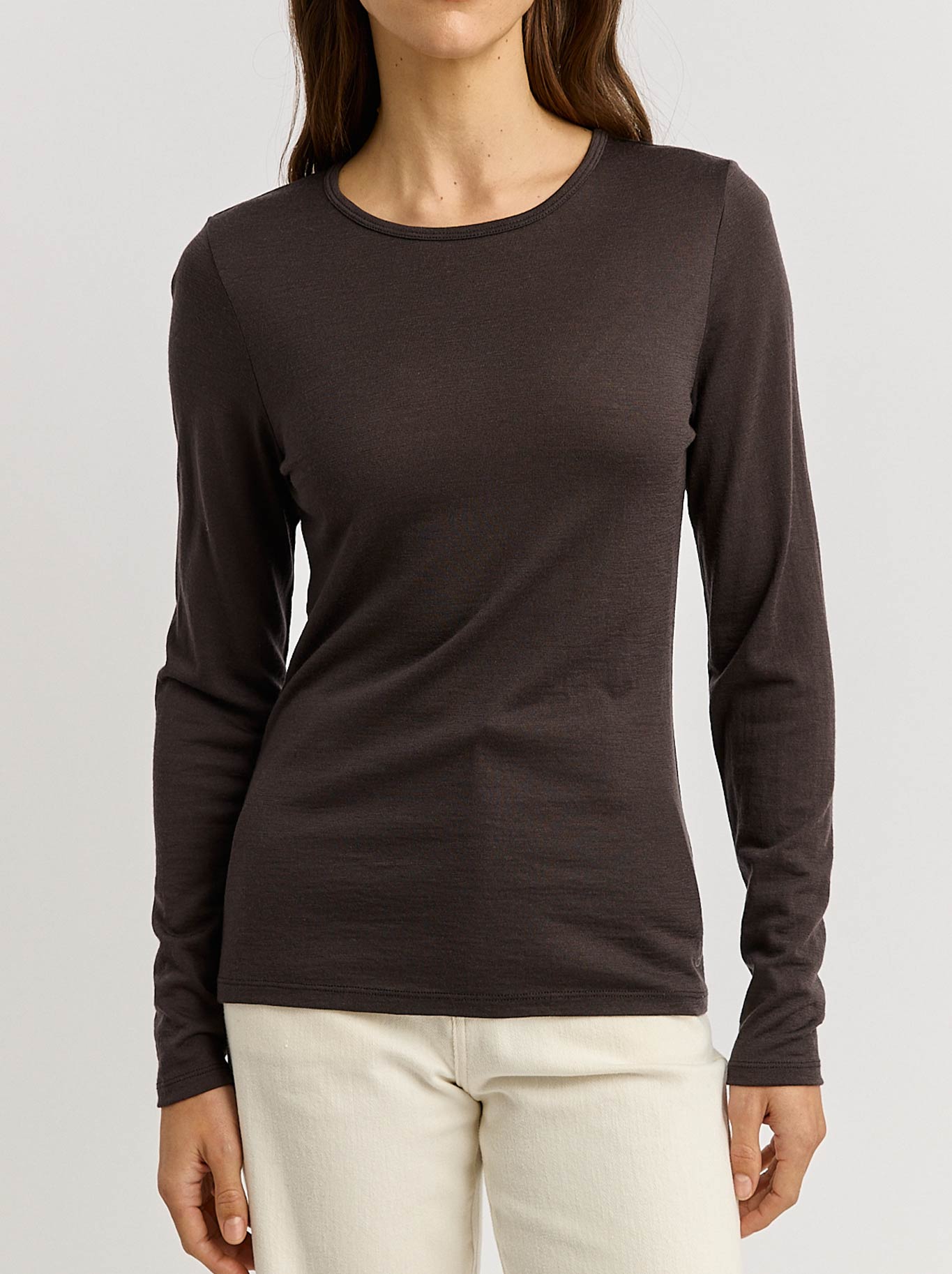 Image of a model wearing Tops. Product name - Toorallie Merino Crew in Date colour by brand - Toorallie
