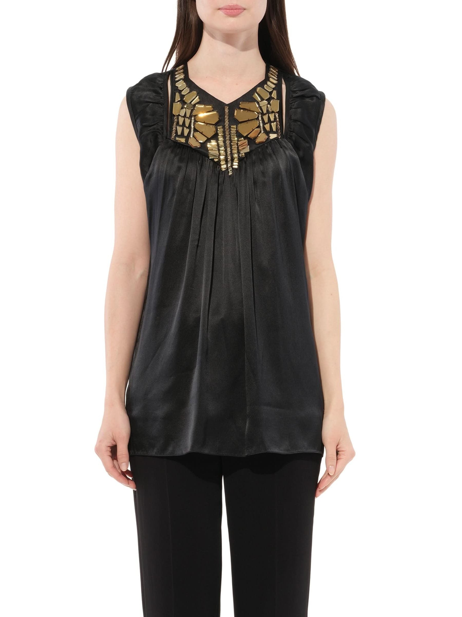 Image of a model wearing Tops. Product name - Top in Black colour by brand - GIVENCHY