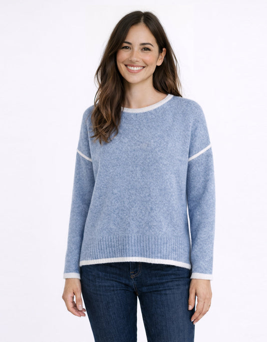 Image of a model wearing Outerwear. Product name - Tori Trim Knit Blue in Blue colour by brand - 132 Fashion