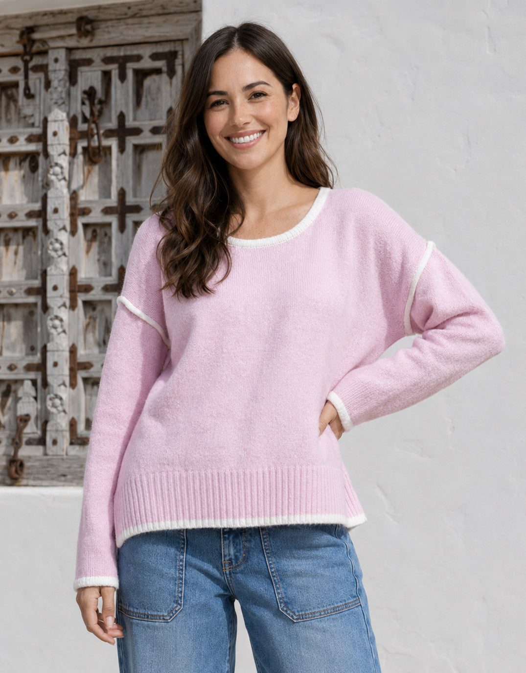 Image of a model wearing Outerwear. Product name - Tori Trim Knit Pink/White in Pink/White colour by brand - 132 Fashion