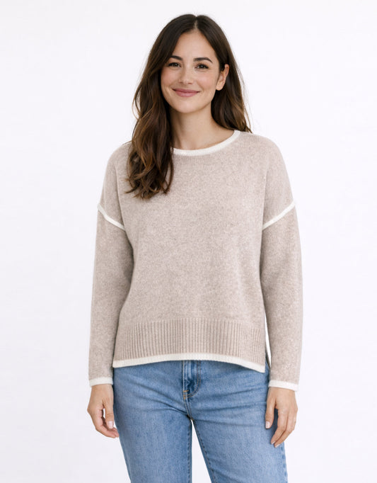 Image of a model wearing Outerwear. Product name - Tori Trim Knit Warm Beige in Warm Beige colour by brand - 132 Fashion