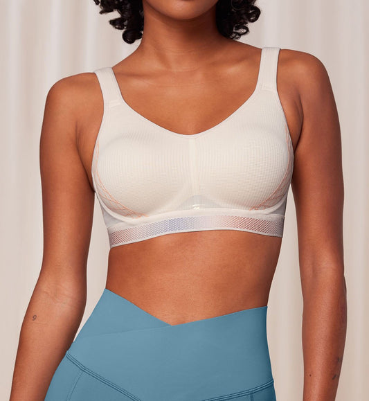 Image of Bras. Productname: Triumph Triaction Cardio Flow Padded Bra in Fresh Powder colour by brand - Triumph