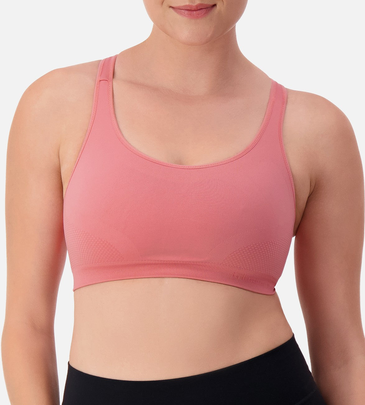 Image of Bras. Productname: Triumph Triaction Ultra Seamfree Top in Salsa colour by brand - Triumph