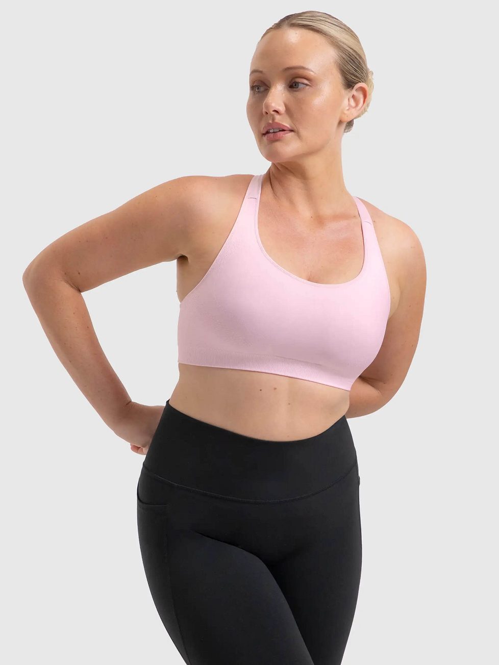 Image of Bras. Productname: Triumph Triaction Ultra Seamfree Top in Spring Mist colour by brand - Triumph