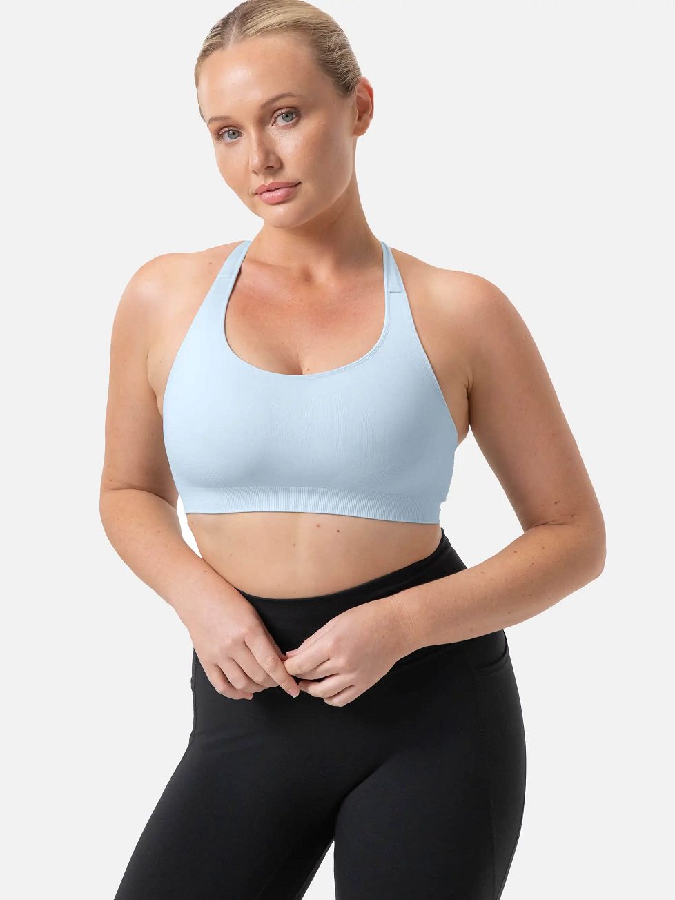 Image of Bras. Productname: Triumph Triaction Ultra Seamfree Top in Pure Blue colour by brand - Triumph