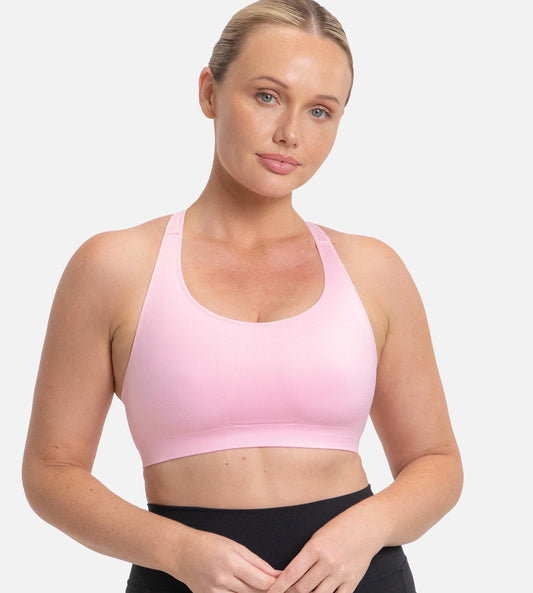 Image of Bras. Productname: Triumph Triaction Ultra Seamfree Top in Pink colour by brand - Triumph