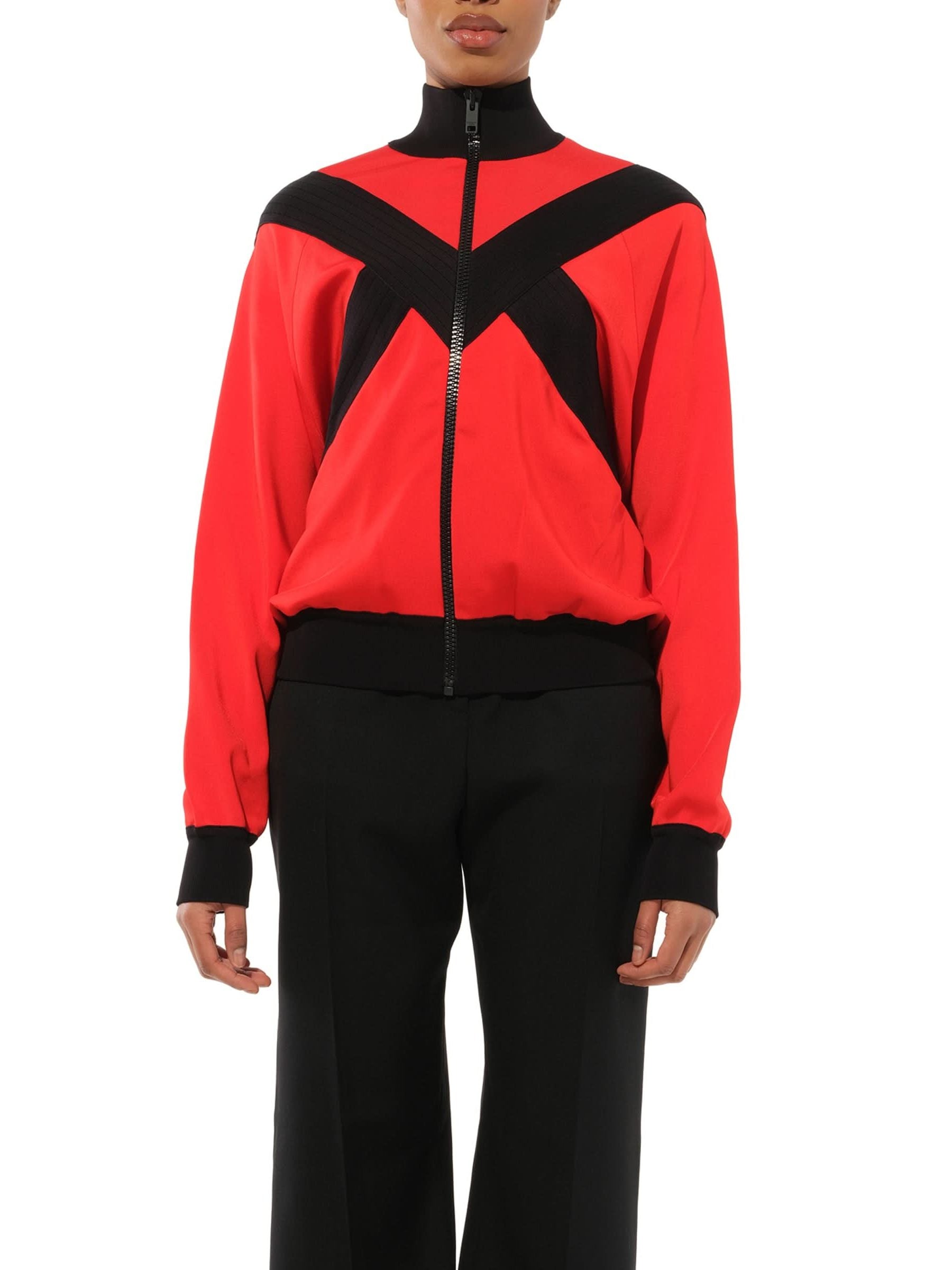 Image of a model wearing Outerwear. Productname: GIVENCHY Turtle Neck Multi Sweater in Red colour by brand - GIVENCHY