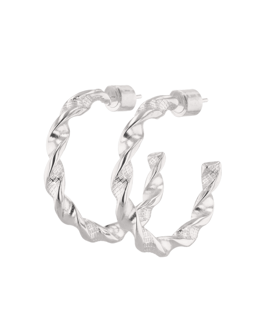 Image of Earrings. Product name - Twist Textured Silver Hoop Earrings in colour by brand - LAVANA