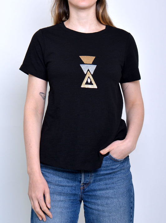 Image of a model wearing Tops. Productname: TWO-T'S TRIPLE TRI TEE in Black colour by brand - Two-T'S