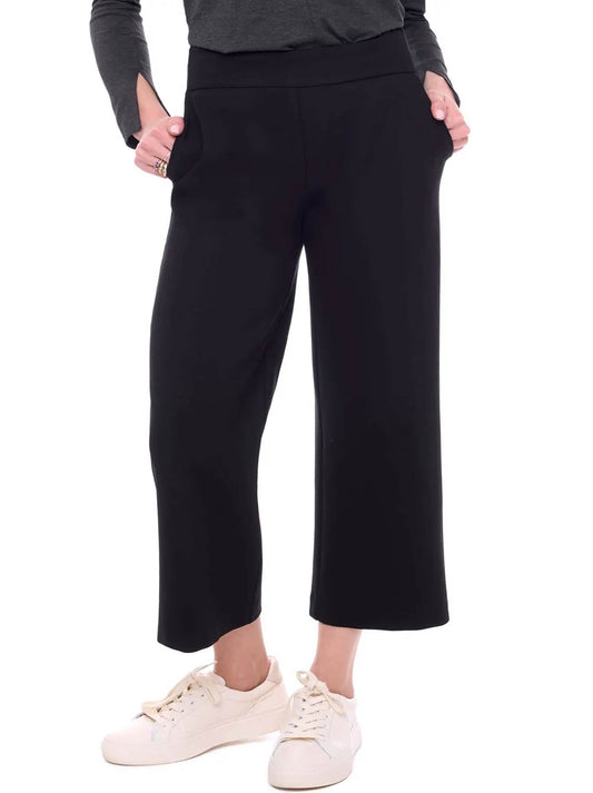 Image of a model wearing Pants. Product name - Up! Cropped Wide Leg Ponte Pant in Black colour by brand - Up Pants