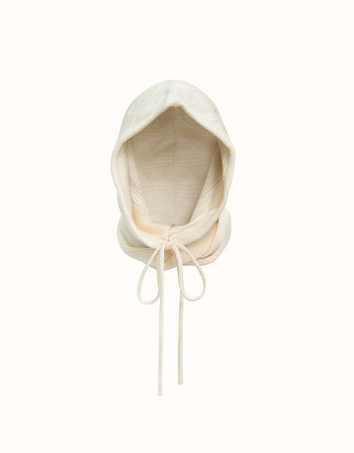Image of a model wearing Outerwear. Product name - Urban UGG® Knotta Hood in Beige colour by brand - Urban Ugg