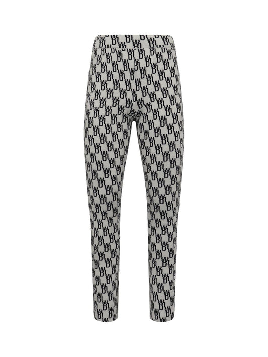 Image of a model wearing Pants. Productname: WE11DONE Fitted Knit Side Open Jacquard Trouser in WHITE colour by brand - WE11DONE