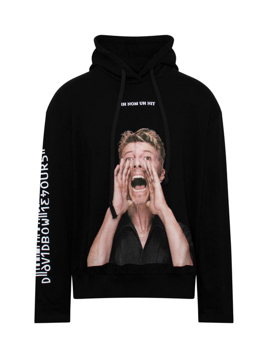 Image of a model wearing Outerwear. Productname: IH NOM UH NIT David Bowie Scream Hoodie in BLACK colour by brand - IH NOM UH NIT
