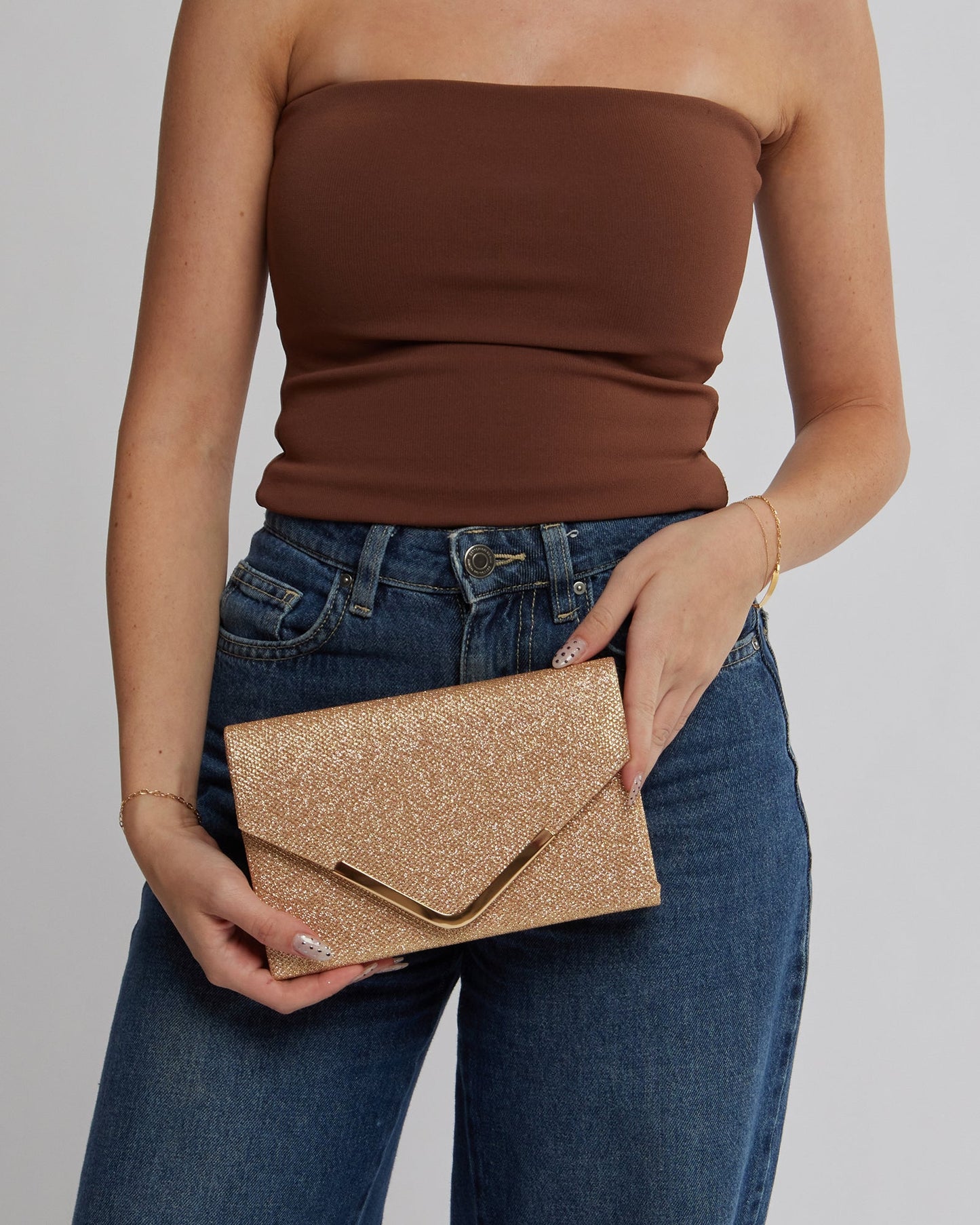 Image of Clutch Bags. Product name - Gold Lila Envelope Clutch Bag in colour by brand - Colette by Colette Hayman