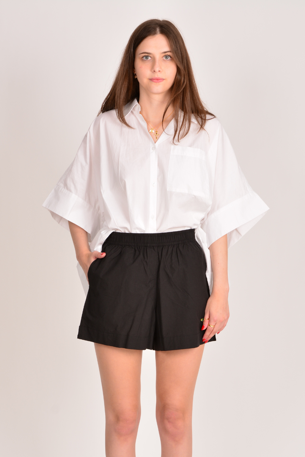 Image of a model wearing Shorts. Productname: Itami Short Black in Black colour by brand - Itami Division
