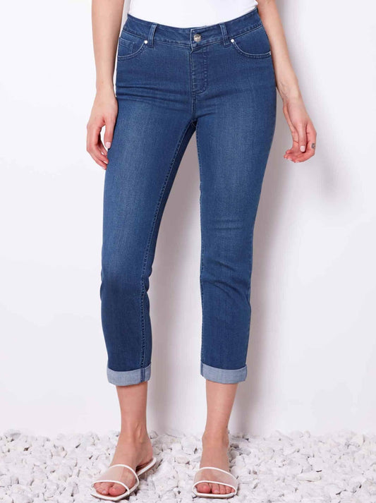 Image of a model wearing Pants. Product name - Up! Denim Crop Pant in Medium Blue colour by brand - Up Pants