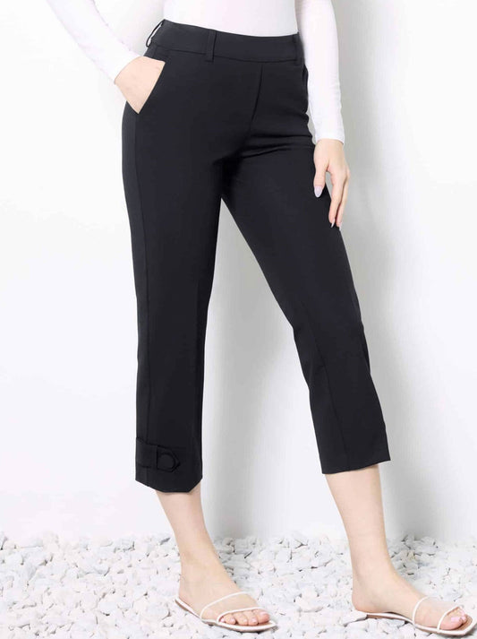 Image of a model wearing Pants. Productname: Up! Solid Compression Tab Detail Cropped Pant in Black colour by brand - Up Pants