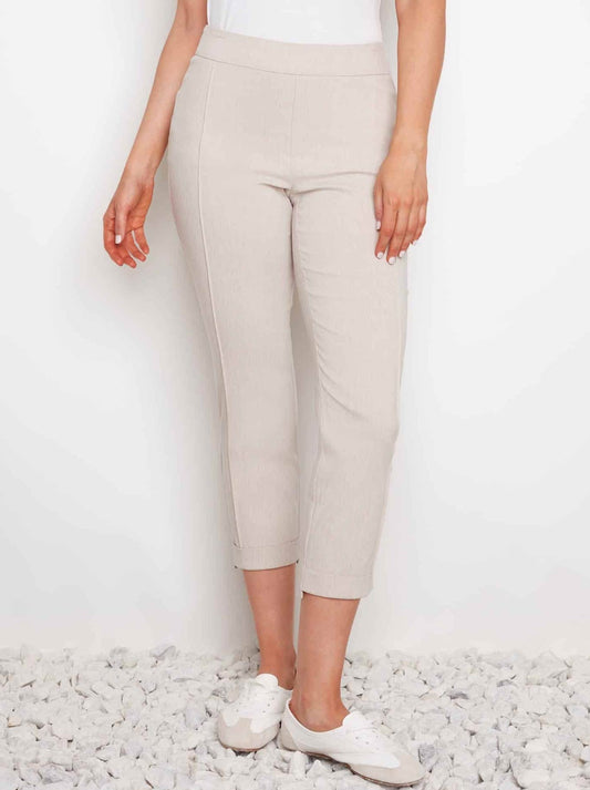 Image of a model wearing Pants. Product name - Up! Techno Cuffed High Low Crop in Linen colour by brand - Up Pants