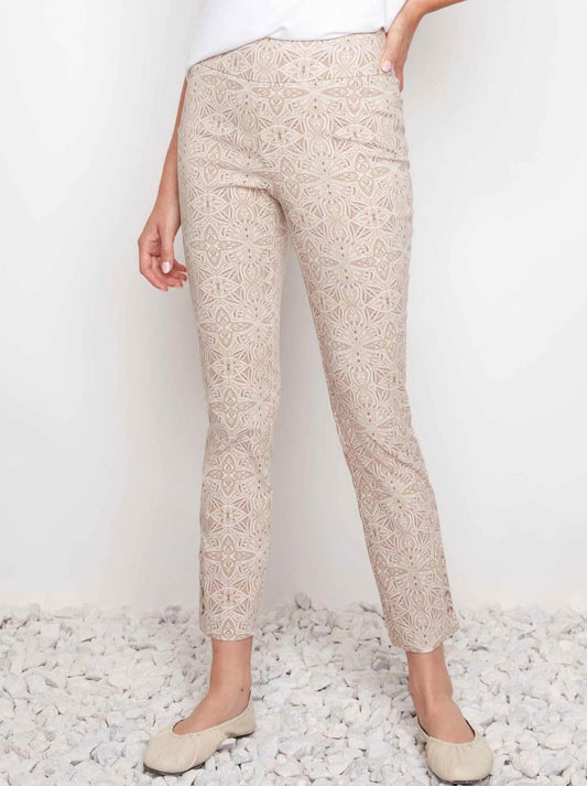 Image of a model wearing Pants. Product name - Up! Techno Button Vent Ankle Pant in Gypsy colour by brand - Up Pants