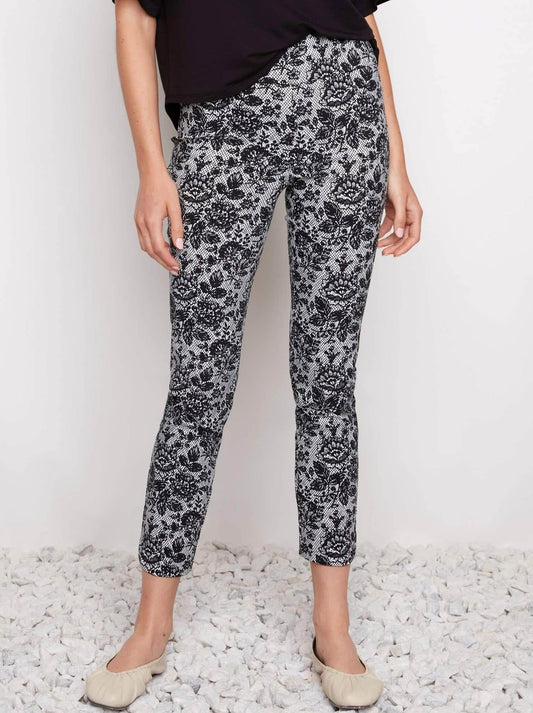 Image of a model wearing Pants. Product name - Up! Techno Slim Leg Petal Pant in Lacey colour by brand - Up Pants