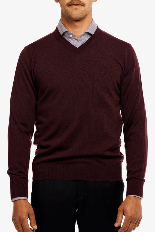Image of a model wearing Outerwear. Product name - Vee Burgundy in Burgundy colour by brand - Anthony Squires