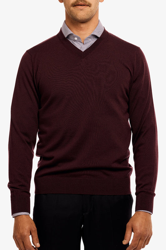Image of a model wearing Outerwear. Product name - Vee Burgundy in Burgundy colour by brand - Anthony Squires