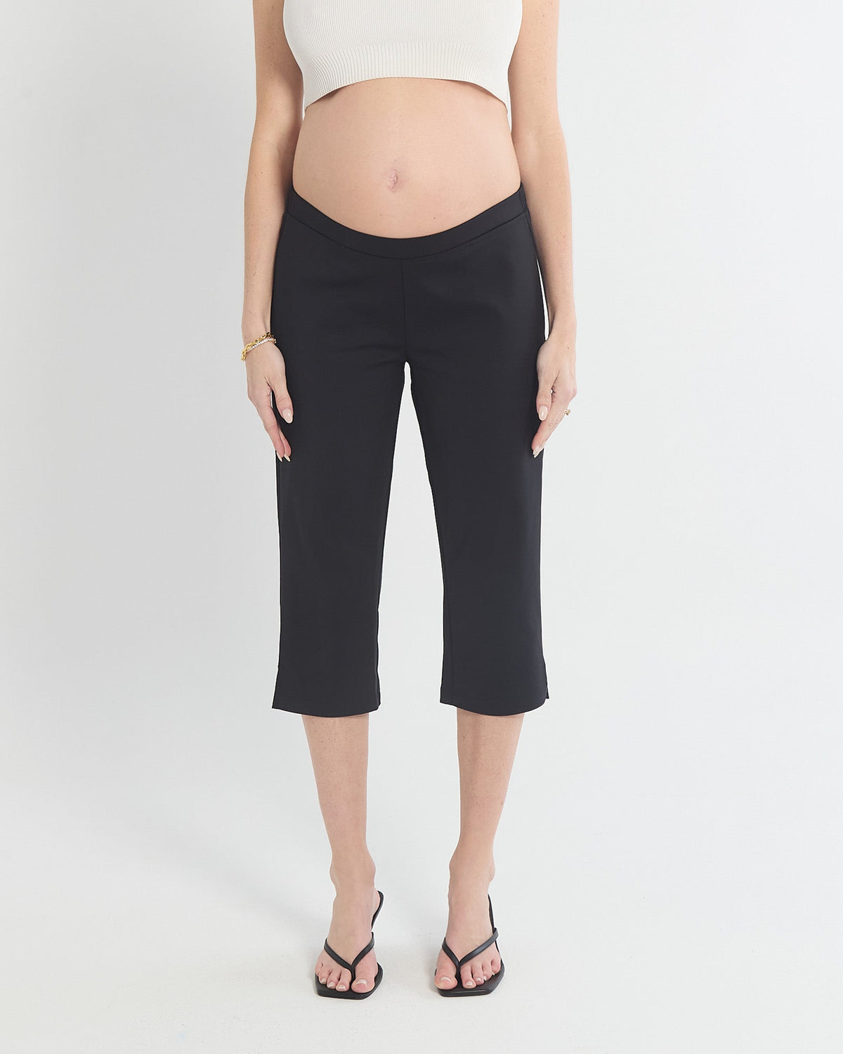 Image of a model wearing Pants. Product name - Vanessa Capri Pants in colour by brand - Soon Maternity
